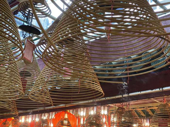 Incense spirals hanging from the ceiling at Man Mo Temple