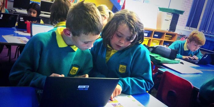 Kids programming at a Codejam - image by Alan O'Donohoe
