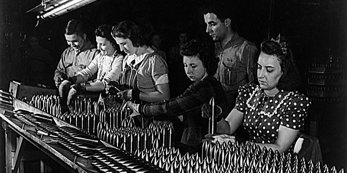 Women working in a WWII munitions factory